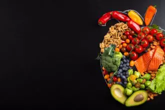 Healthy food arrangement in realistic heart shape, diet for heart and cardiovascular system